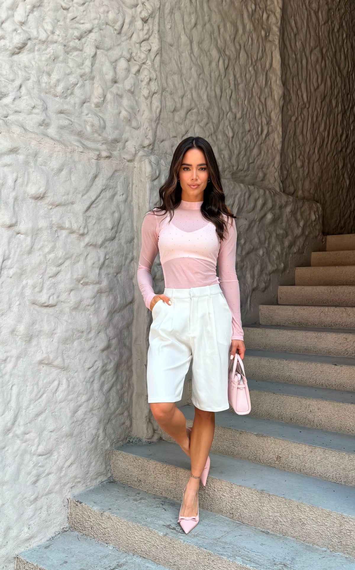 Ivory Pleated Tailored Bermuda Shorts by Navissi